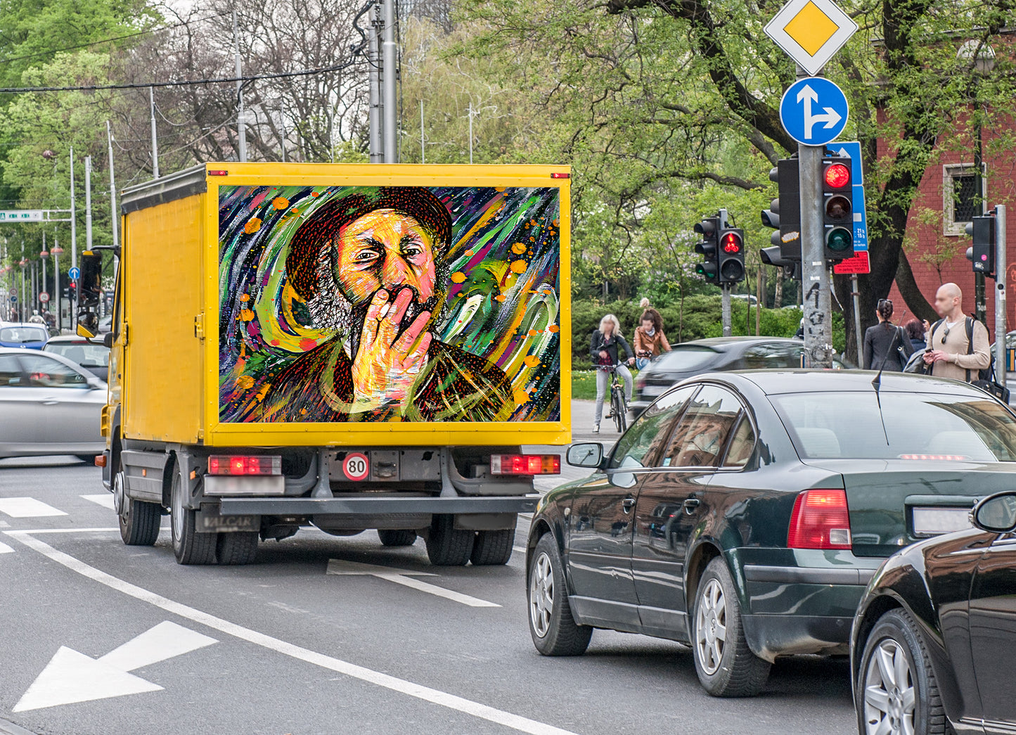 Mr. Brainwash mixed media portrait by Doug LaRue one the back of e yellow panel truck