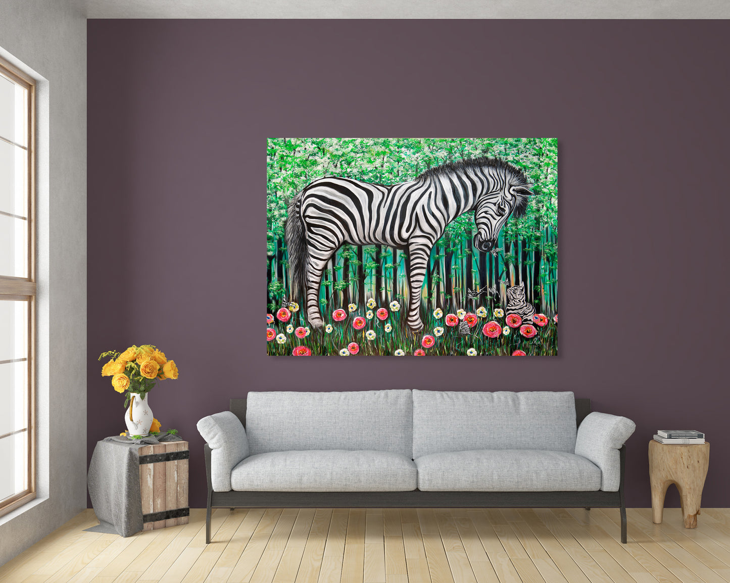 Living room with a zebra painting Zebra Striped Friends mixed media art by Doug LaRue on a plum wall, gray sofa, and side tables with flowers.