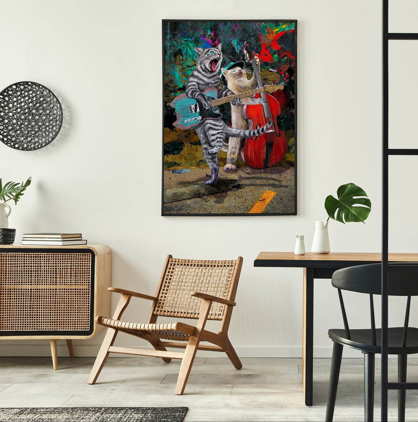 A colorful framed wall art print depicting a zebra and a cat playing a double bass ensemble, displayed in a modern dining room setting.