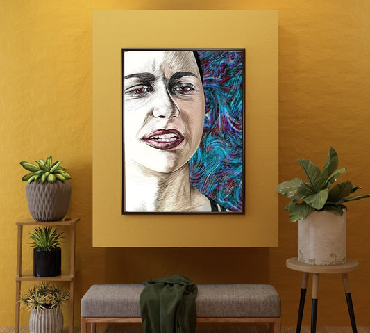 A framed vertical portrait painting of a woman hangs on a textured mustard yellow wall in a styled room setting with a bench, side tables, and potted plants. Emma Gonzales by Doug LaRue