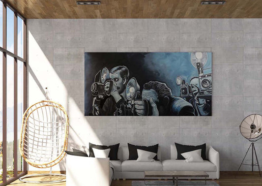 Ringside Press sports photographers artwork on a concrete wall in a living room