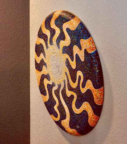 Sunburst by Doug LaRue on a wall in a stairway