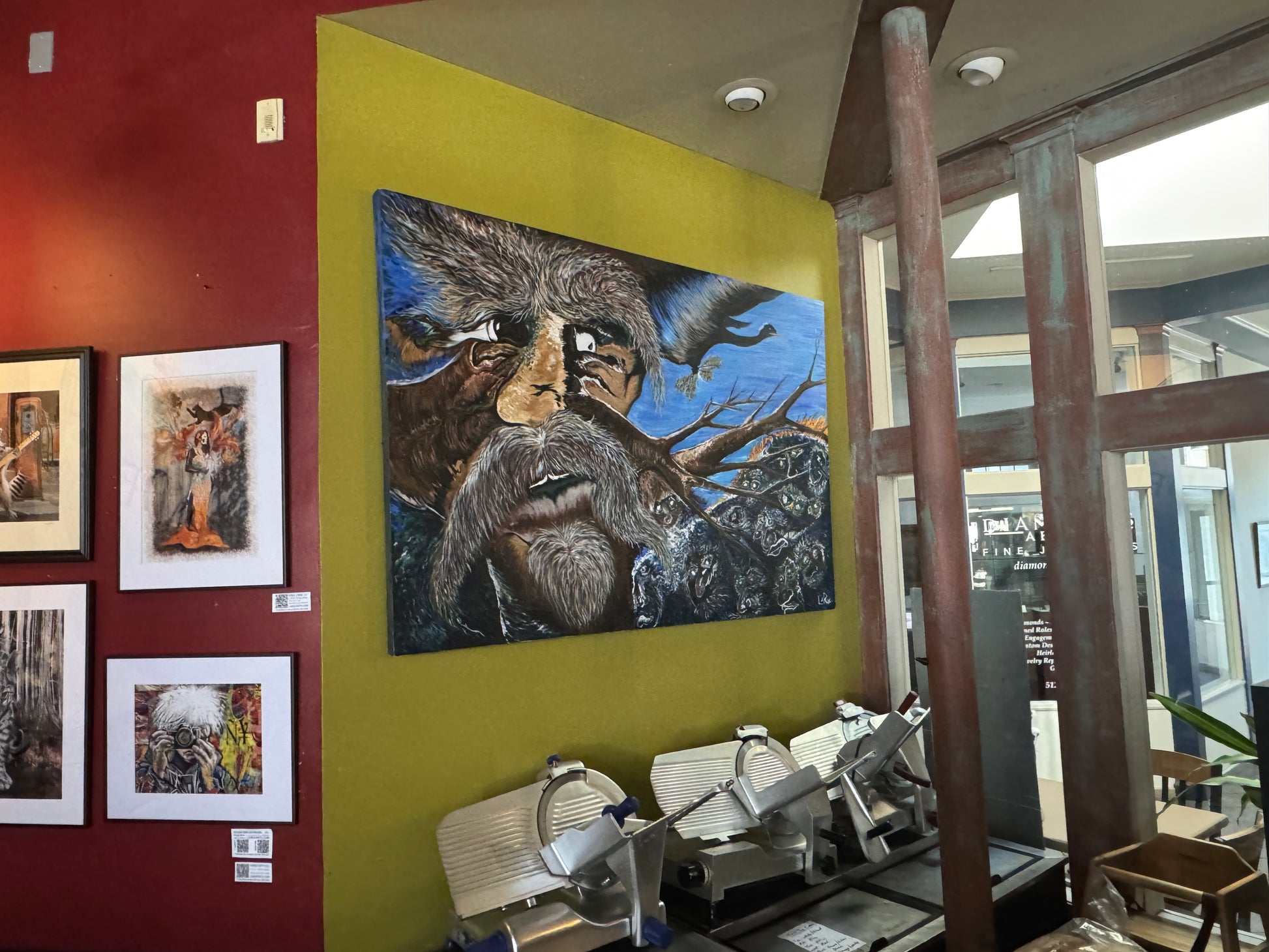 Tree of Life River of Souls painting on the back wall of NeWorlDeli