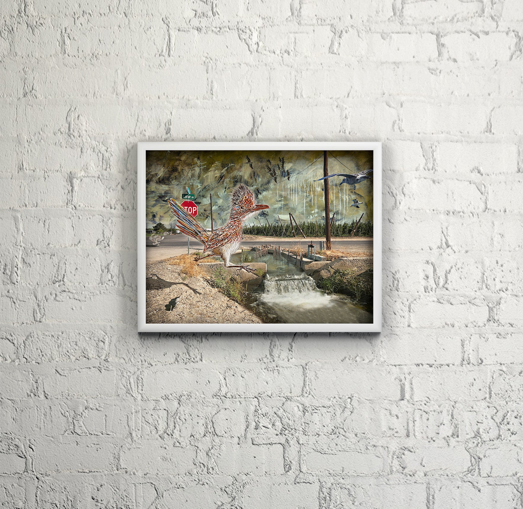 Larue Road Runner mixed media art by Doug LaRue on a white brick wall in a study