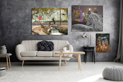 Three vertical canvas wall art prints displayed on a textured dark gray wall above a modern white sofa in a styled living room. 