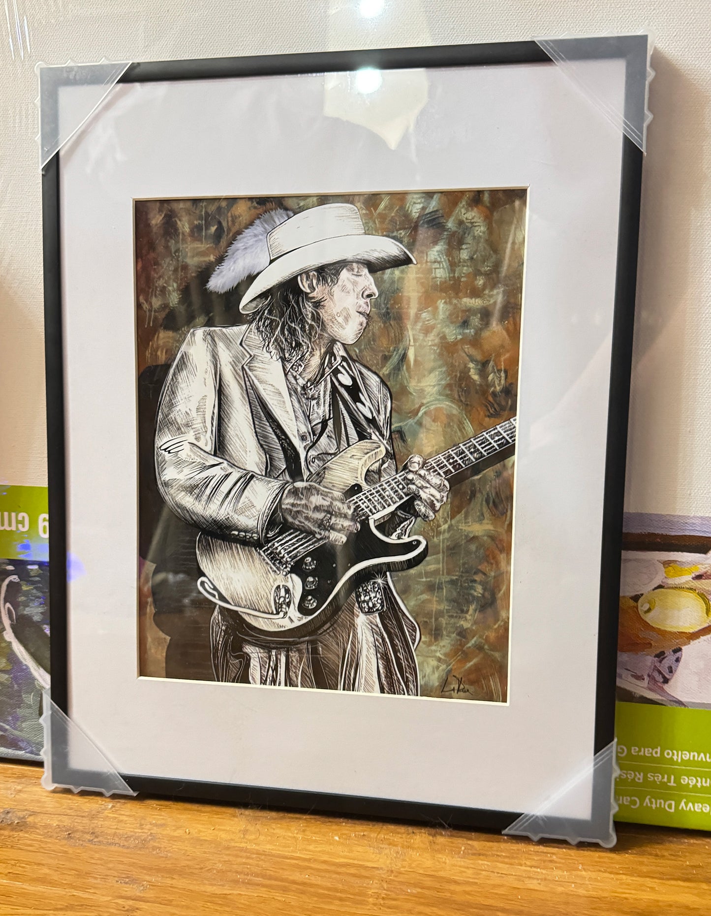 Stevie Ray Vaughan 22 artwork by Doug LaRue 11x14x1 black metal frame