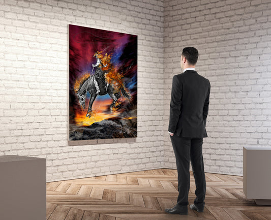 A man in a dark suit stands in a gallery room with a white brick wall and wood floor, viewing a large vertical canvas print of a warrior on a horse against a fiery red, orange, and blue background.