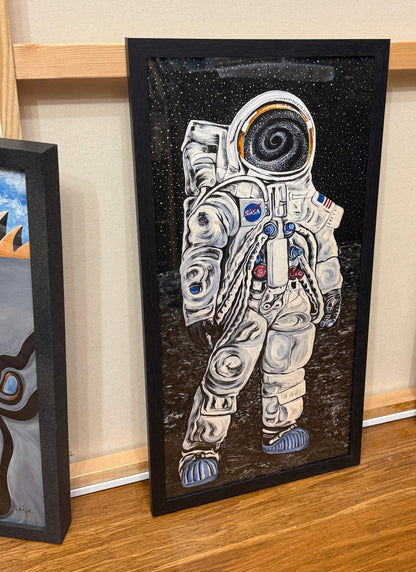 Quantum Astronaut 12x24 museum print in a black wood frame