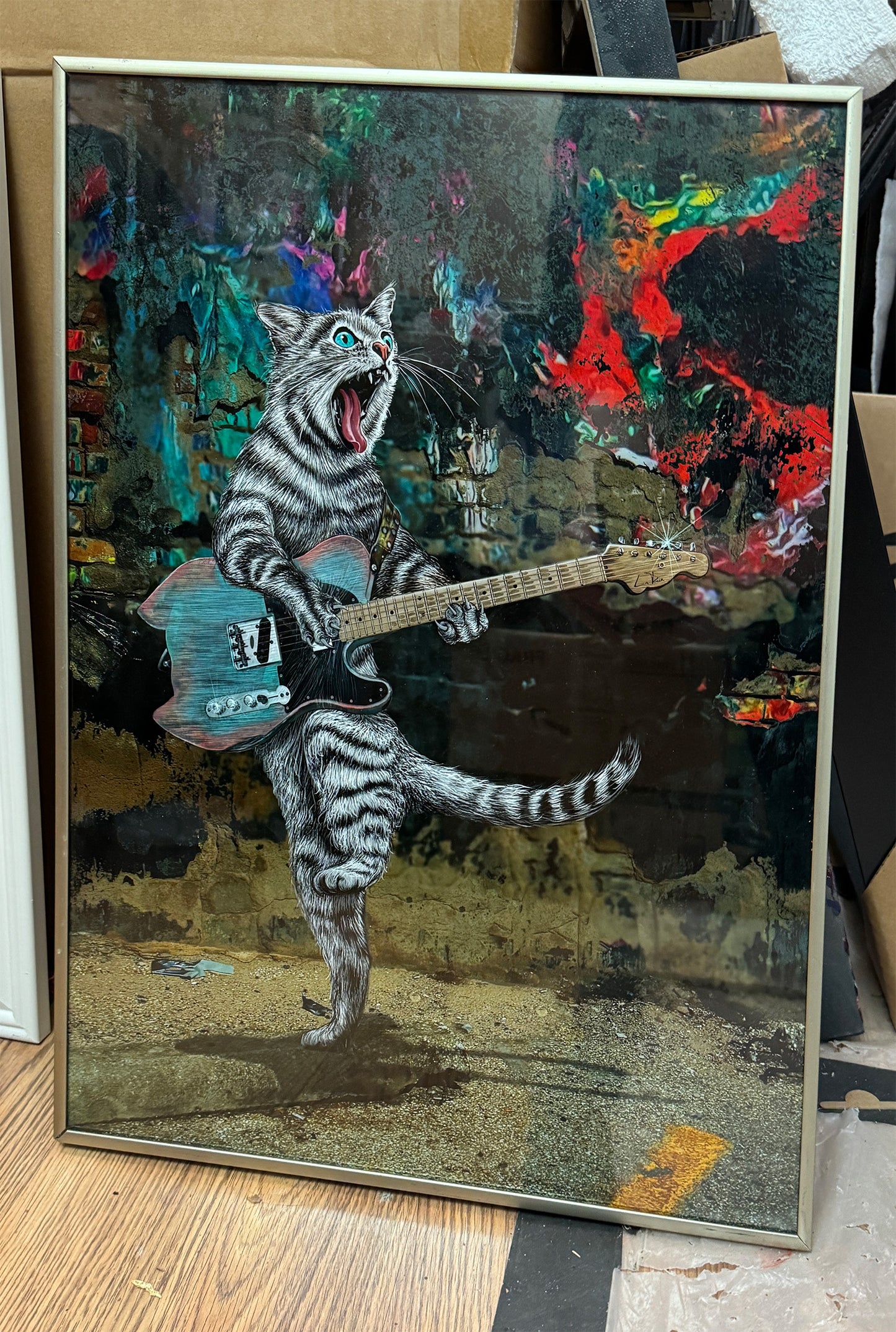 Buskers Electric Guitar Cat in a 15x20 metal frame @NeWolDeli