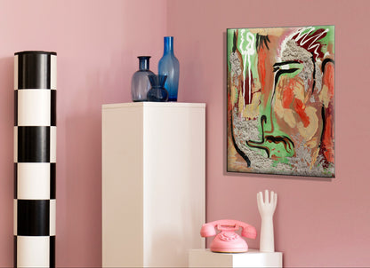 An abstract canvas art print featuring a stylized face in green, orange, black, and beige tones, displayed on a pink wall in a modern room setting next to a black and white checkered column and a white cabinet. Chuy by Doug LaRue