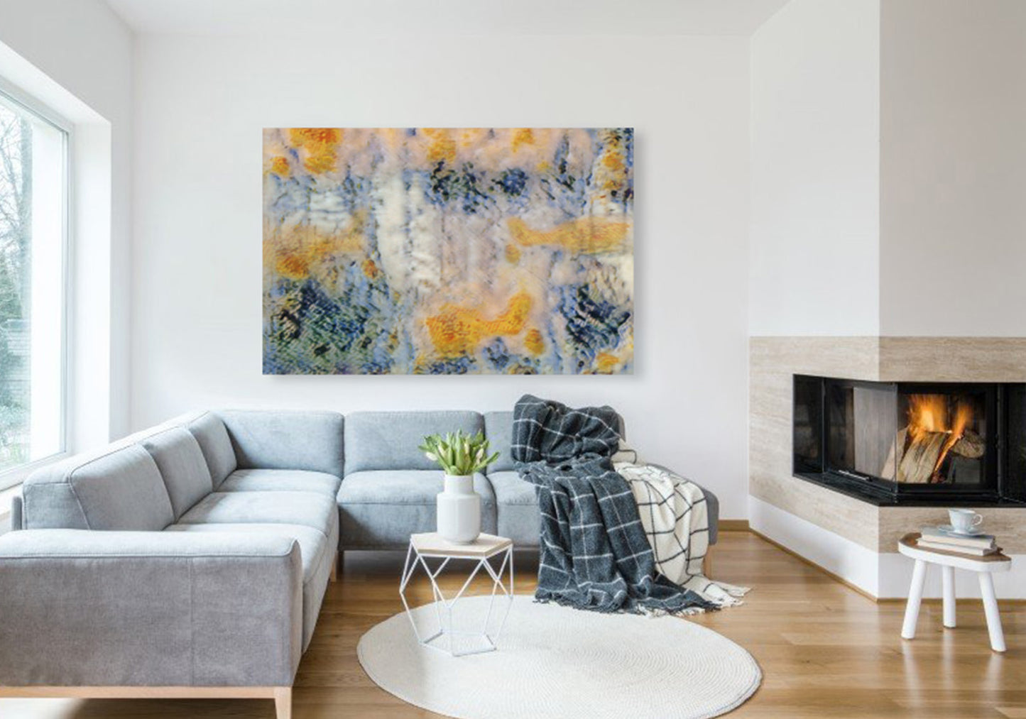 Frosted Goldfish mixed media abstract by Doug LaRue near a fireplace in a living room over a couch.