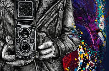 Illustration of a person holding a vintage camera with a colorful, abstract background John Lennon Twin Lens by Doug LaRue
