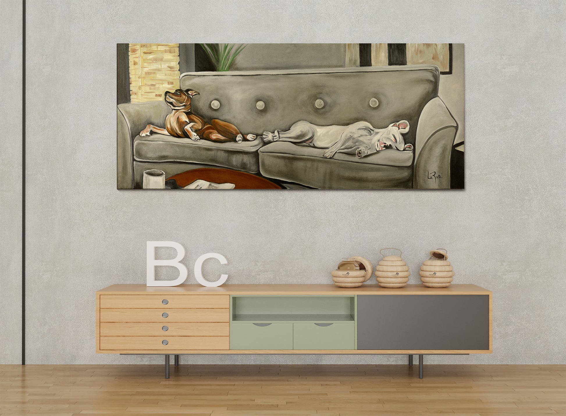 Let Sleeping Dogs painting by Doug LaRue on a wall over a cabinet