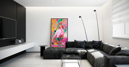 Modern living room with a black sectional sofa, colorful flamingo artwork, and minimal decor. Pink Flamingo A21 by Doug LaRue