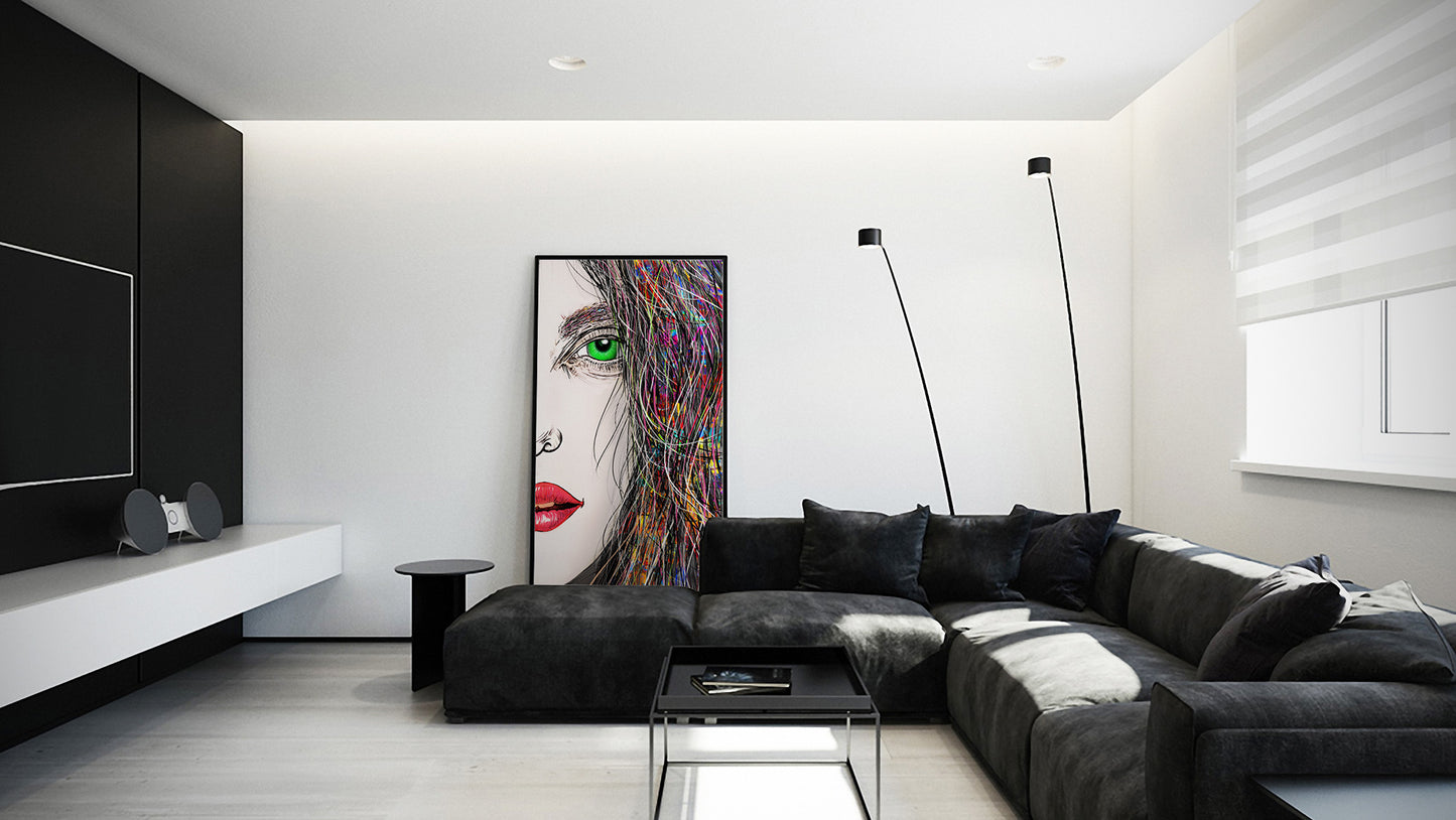 Tara Khimaira Green Eye by Doug LaRue large framed print leaning against the back wall of a modern living room with grey suede sectional couch in a black and white motif