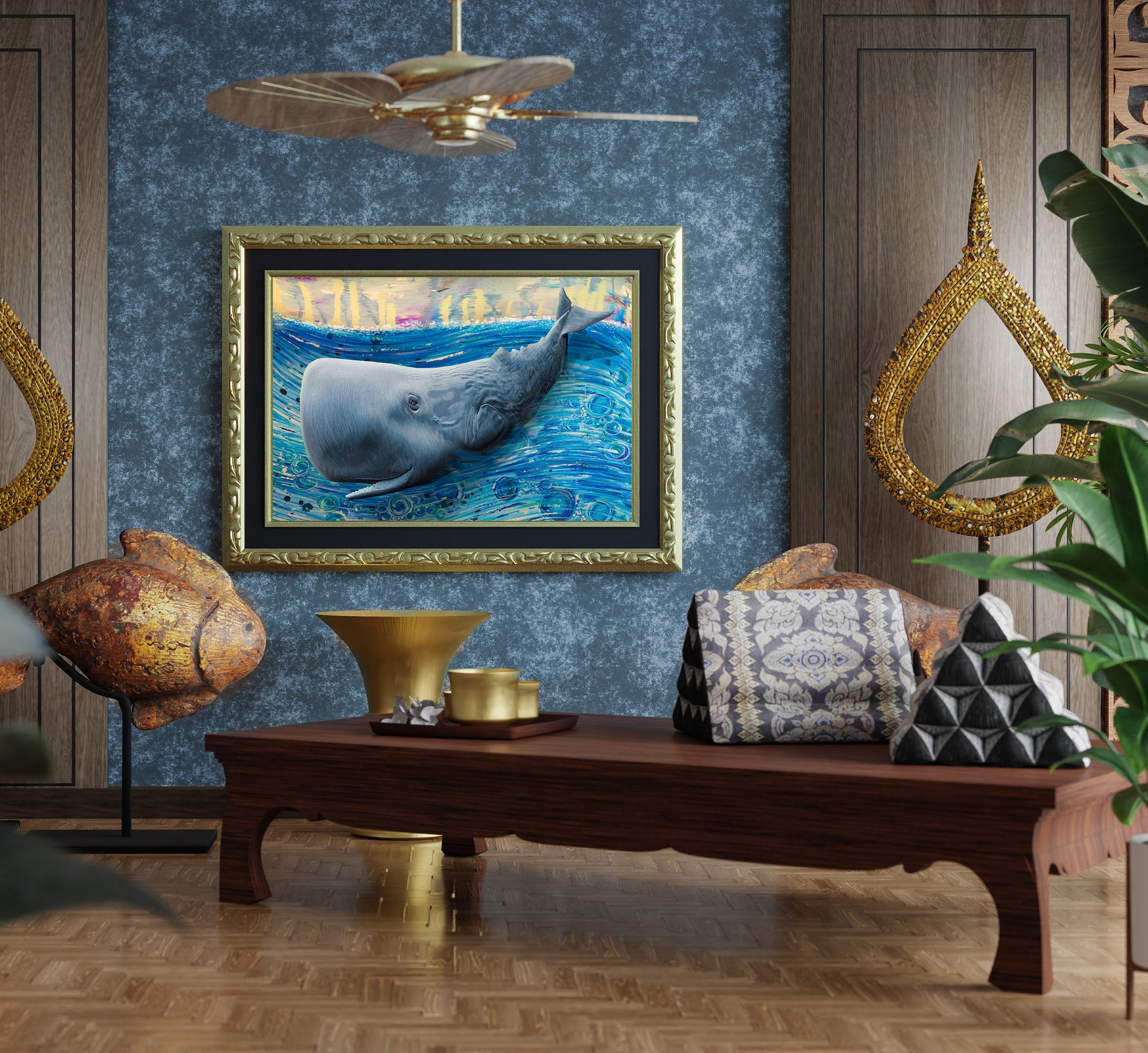 A framed painting of a gray whale swimming in blue ocean water, displayed on a textured blue wall in a styled room with a wooden bench, decorative pillows, and gold wall art. Whale by Doug LaRue