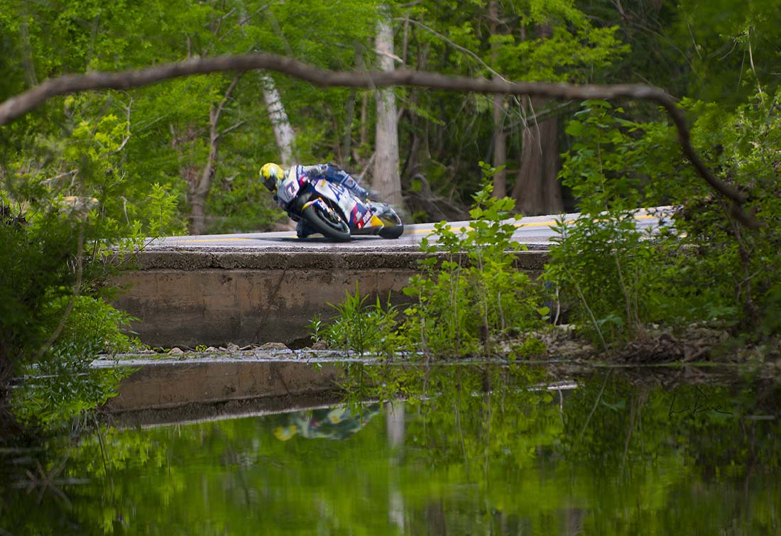 GP Grand Prox Motorcycle on a creek bridge photograph by Doug LaRue