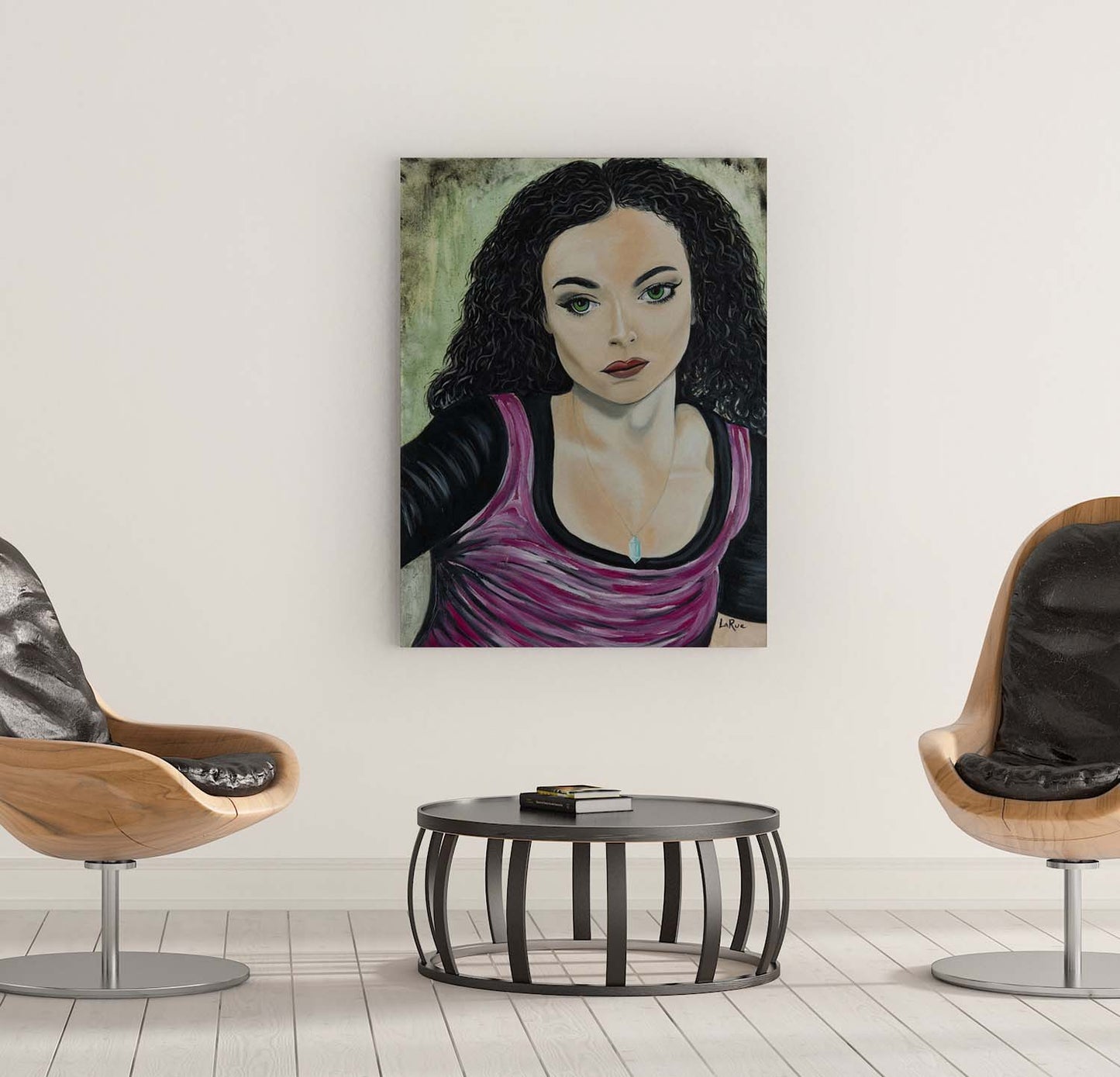 Annie Cabannie Portrait print on a wall by chairs