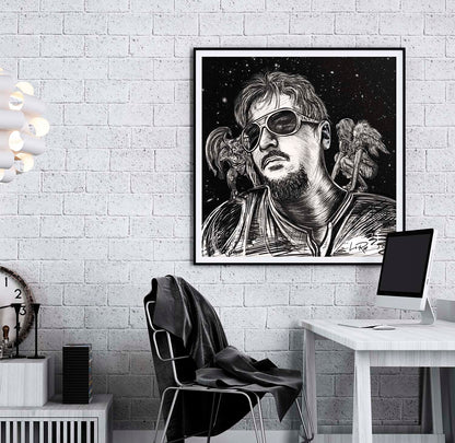 Doug LaRue Artist Portrait in a black metal frame on a white brick wall in an office