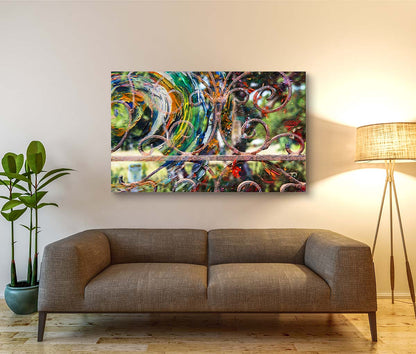 Rustic Iron abstract mixed media art by Doug LaRue metal print over a brown weave couch